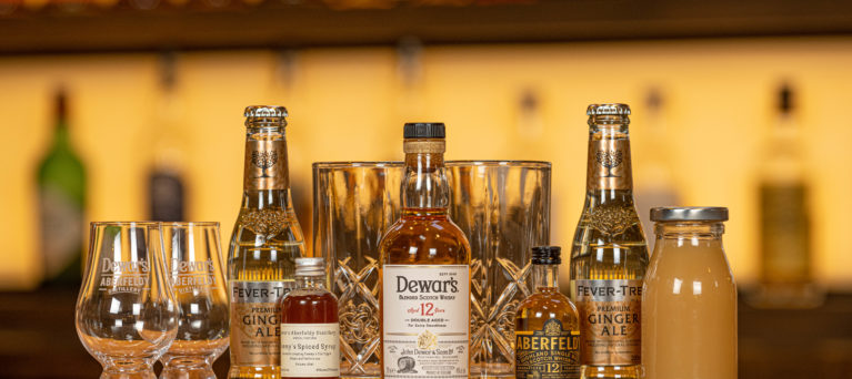 Image of miniature whiskies and mixers for cocktail making masterclass